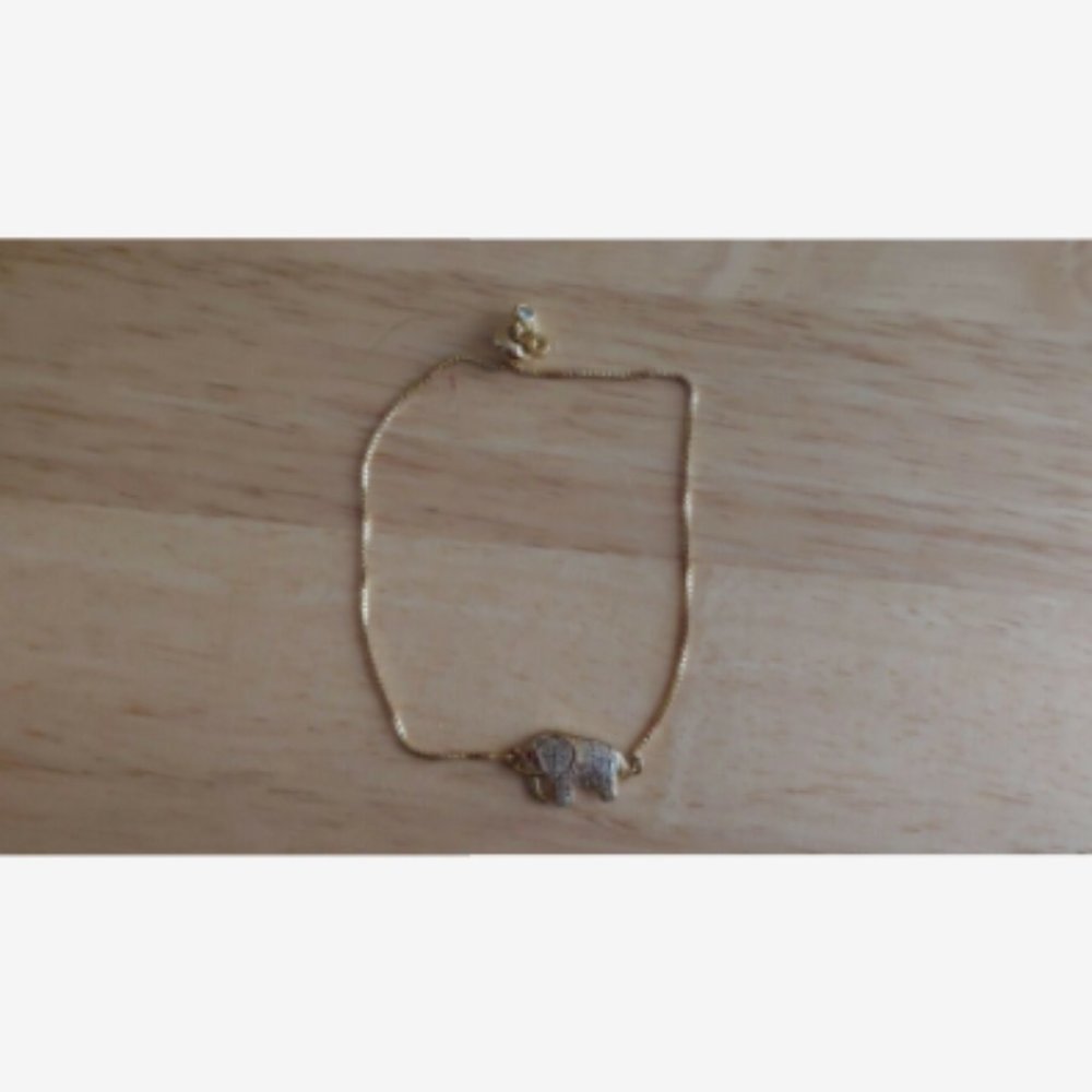 Gold Tone and White CZ Elephant Pendant